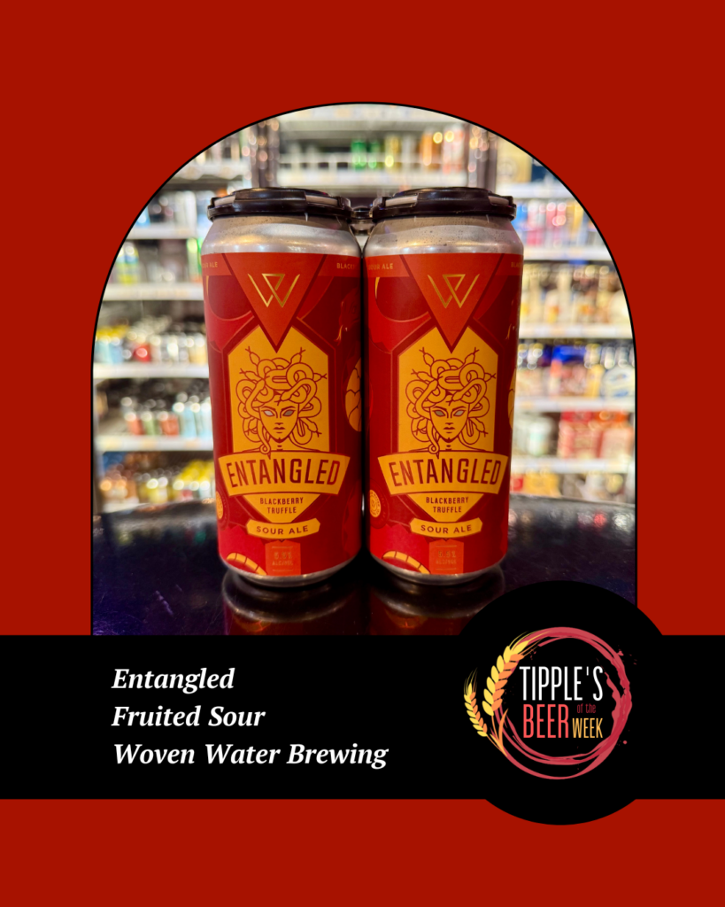 Promotional graphic for Tipple’s Beer of the Week on a deep red background. Centered is a photo of two cans of Entangled, a Fruited Sour from Woven Water Brewing, displayed in front of refrigerated beer coolers inside the store.

The can artwork features a striking red and orange design with an illustration of a Medusa-like face and the words “Entangled – Blackberry Truffle Sour Ale.” The beer style combines blackberry and chocolate-inspired flavors in a fruited sour.

A black banner spans the bottom of the graphic. On the left, white text reads:

Entangled
Fruited Sour
Woven Water Brewing

On the right is the circular Tipple’s Beer of the Week logo featuring a wine-colored ring, wheat graphic, and the Tipple’s branding.

Call to Action: Stop by Tipple’s Brews & Wine to pick up this week’s featured beer, Entangled by Woven Water Brewing—a unique blackberry truffle-inspired fruited sour while supplies last.